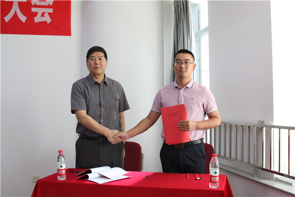 3.王董事长与八分公司经理吕志伟签订槐荫区档案馆及方志馆建设工程《项目目标责任书》_副本