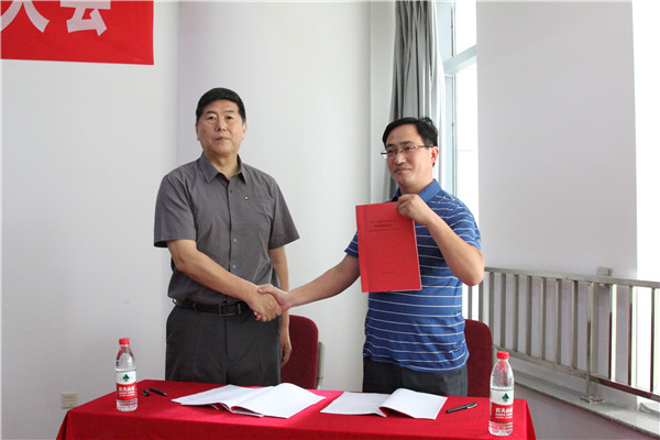 4.王董事长与直属公司经理范立东签订泰安新泰碧桂园工程《项目目标责任书》_副本